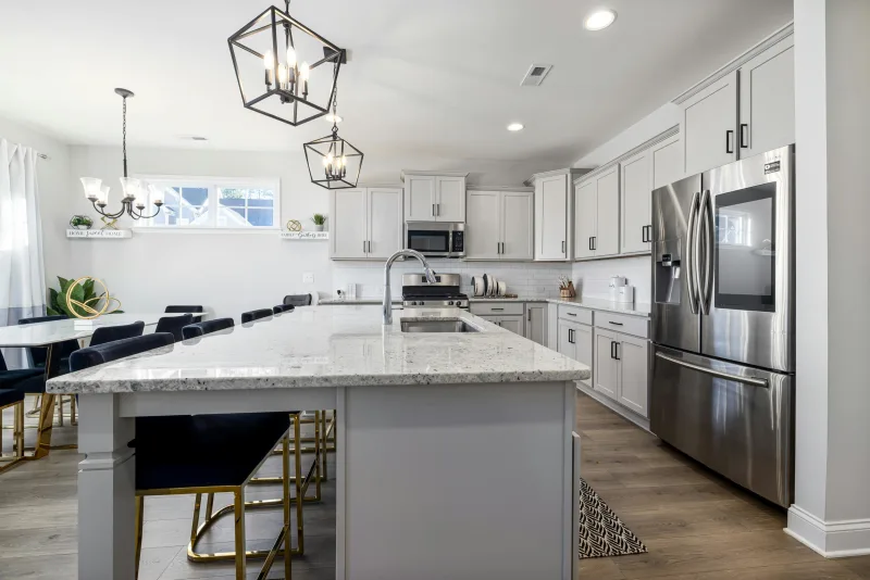 Granite countertops in a traditional style kitchen by Cost Plus 20
