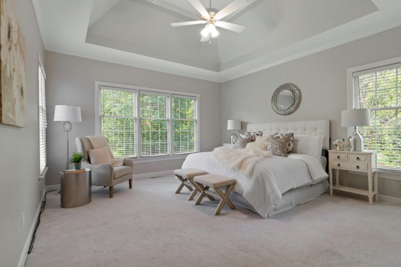 Traditional bedroom with a cozy soft carpet floor by Cost Plus 20